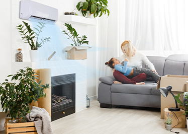 Family on couch with plants and clean air 